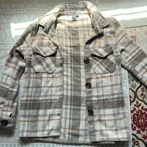 Its a cream and tan and brown color